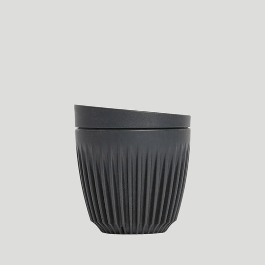 Recyled coffee mug on white background