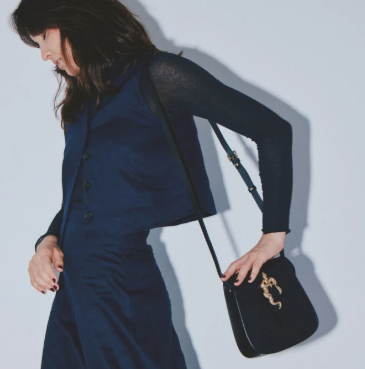 Sac en cuir. boucle serpent