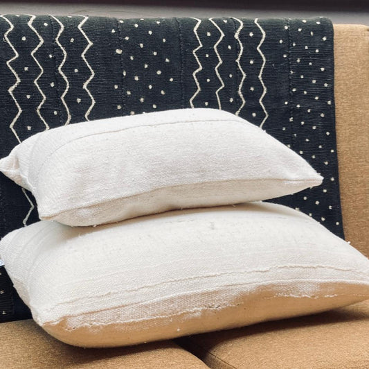Housse de coussin bogolan artisanal en coton bio, fabrication belge signée Studio Matongé